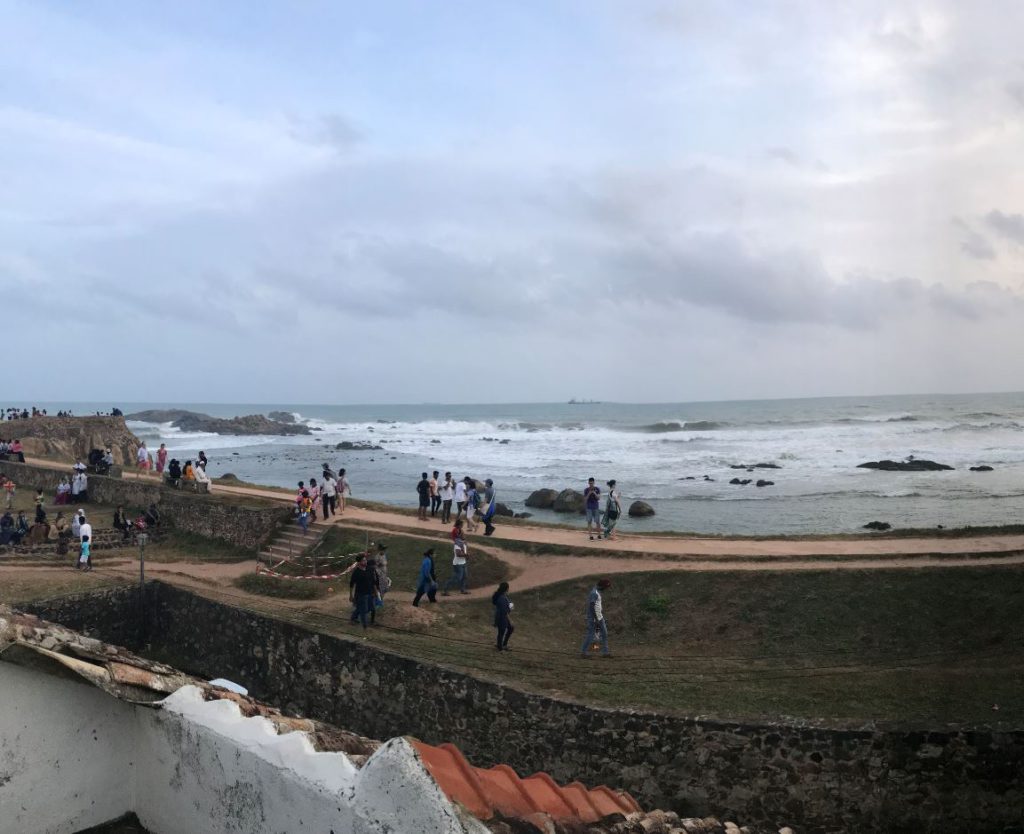 People on Flag Rock Bastion during sunset