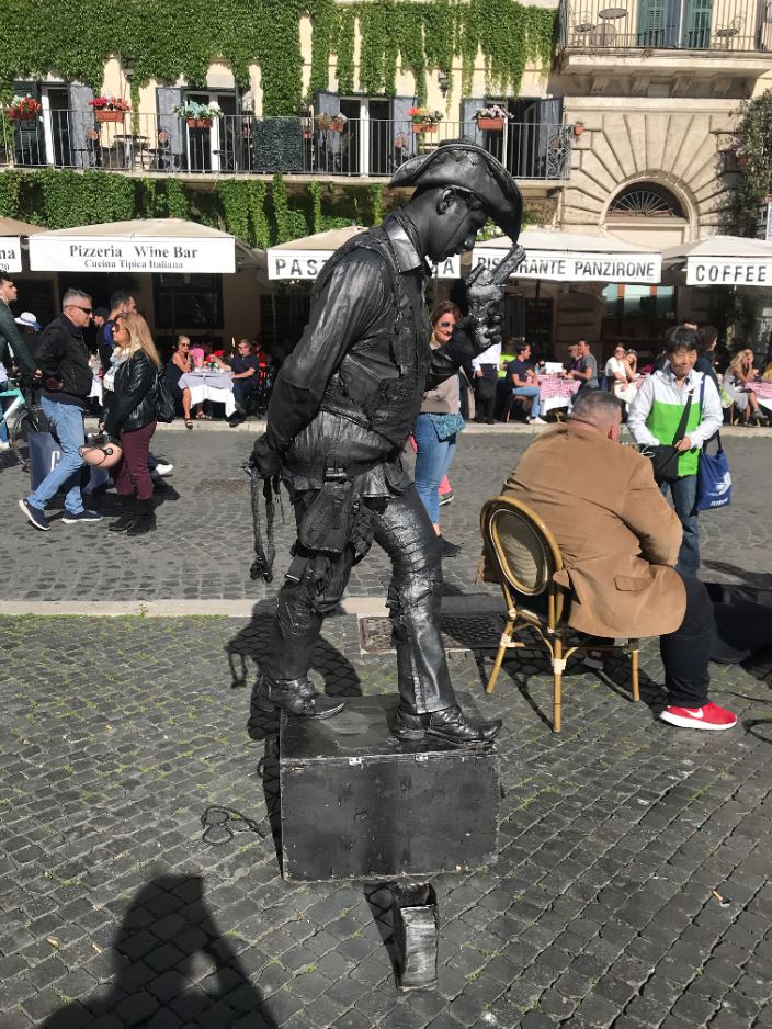 An artist in Piazza Navona