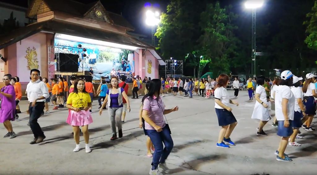 Locals dancing at a gathering in Chiang Rai