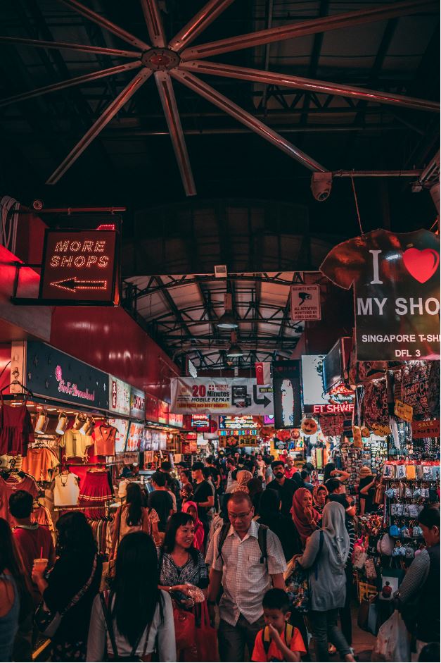 Bustling night market on Bugis Street, Singapore.