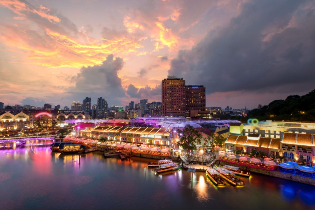 Colorful light building at night in Clarke Quay, Singapore.