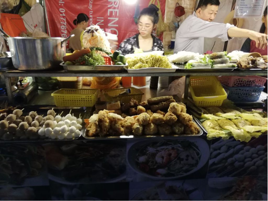 Food vendor in the night market at Phnom Penh