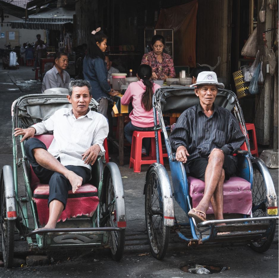 Men sitting on a cart in Phnom Penh