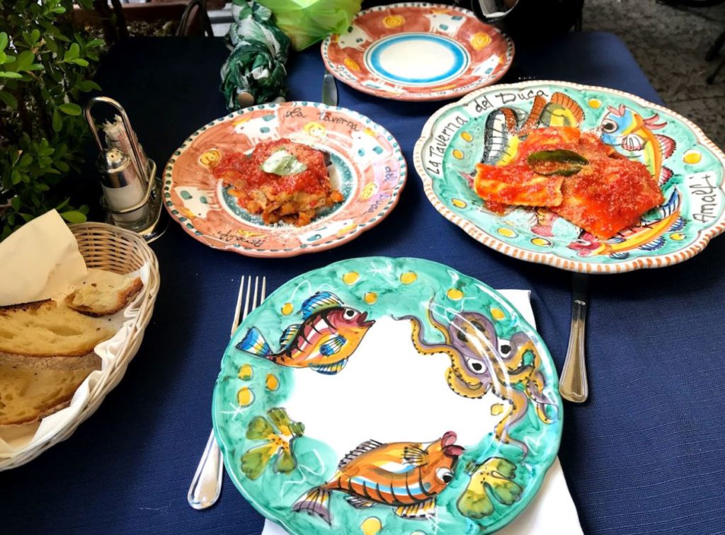 typical lunch on a ceramic plate in the Amalfi coast