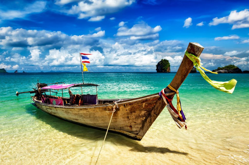 Long tail boat on tropical beach, Krabi, Thailand