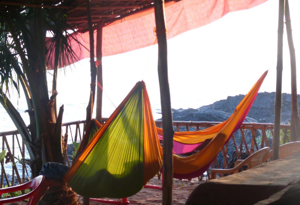 Tourists lying on the hammock in Gokarna