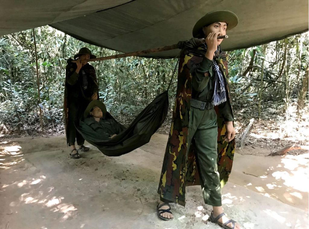 wax statues of soldiers carrying a victim to the emergency ward in the tunnel