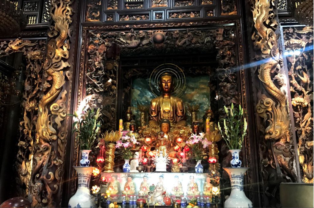 The prayer chambers of Vinh Trang Pagoda made in indigenous Vietnamese and Chinese style