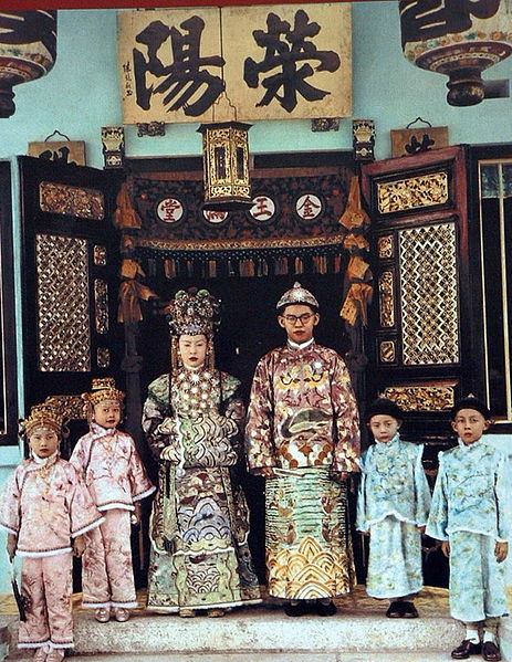 A Peranakan couple at their wedding ceremony