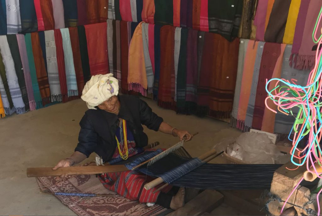 Local women weaving clothes in Karen Village