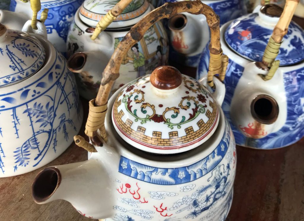 Chinese herbal tea served in teapots at the viewpoint