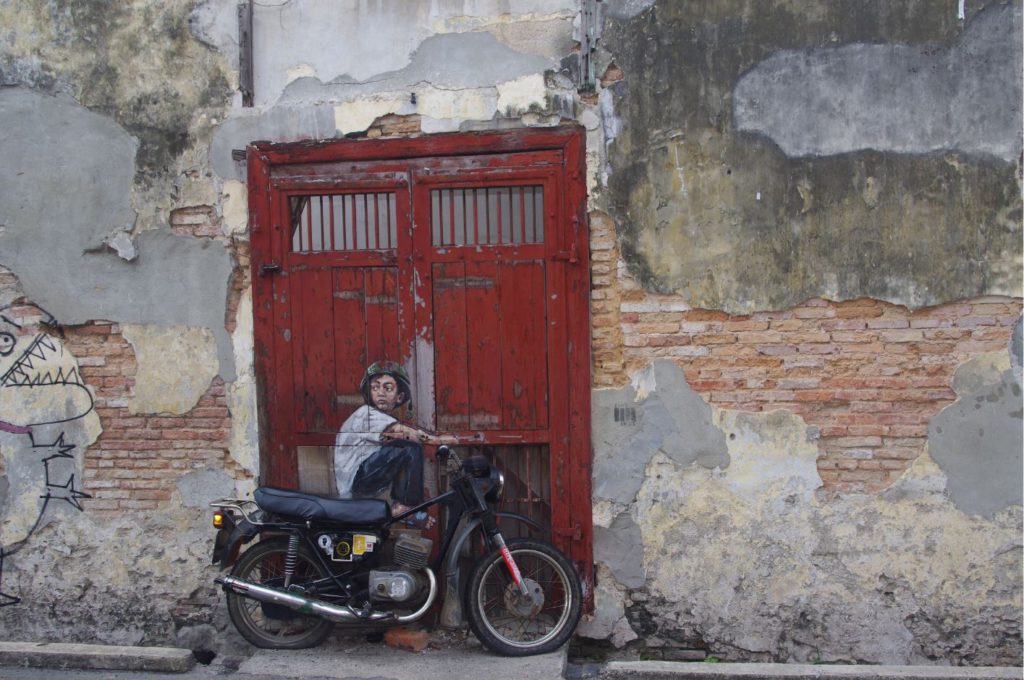 Boy on Motorcycle by Ernest Zacharevic, Penang