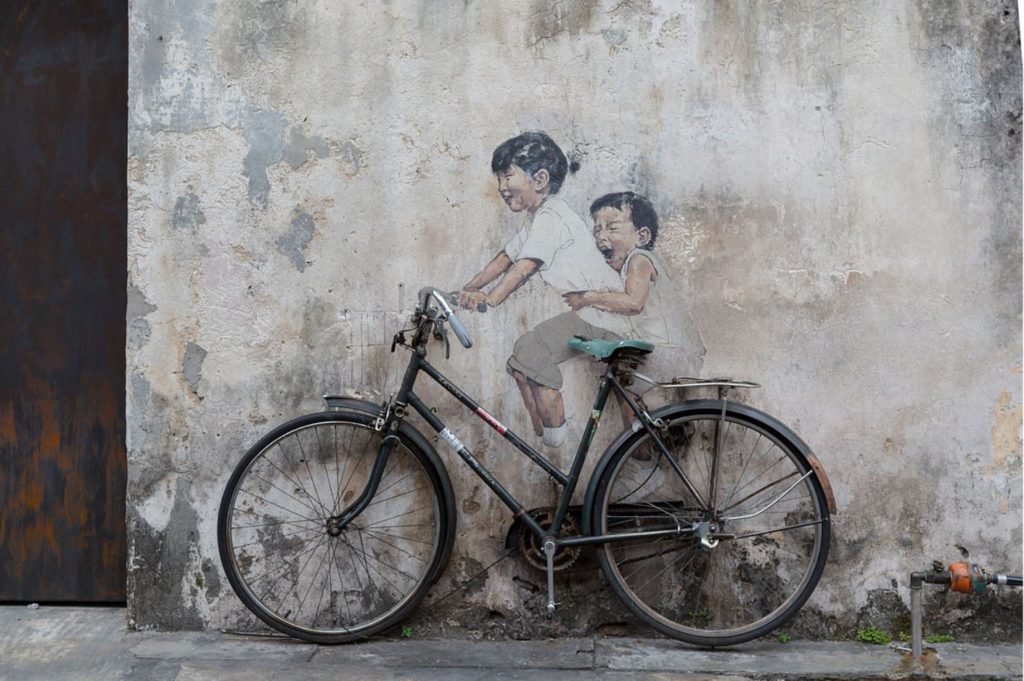 Mural - Kids on bicycle by Ernest Zacharevic, Penang