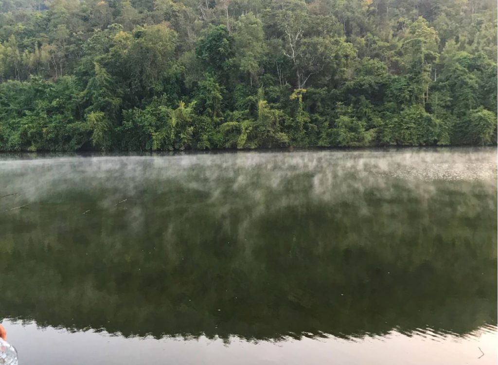 Mist on top of river in Erawan National Park during the winter months