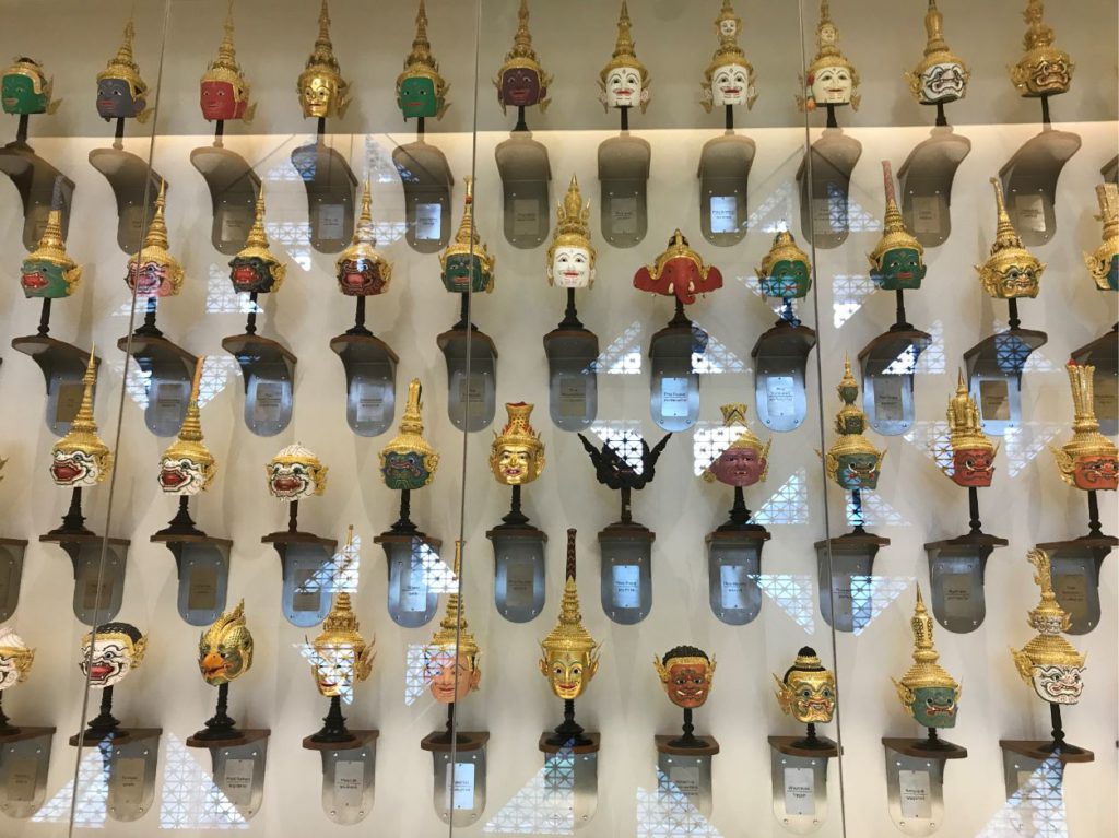 A collection of Khon masks inside MOCA