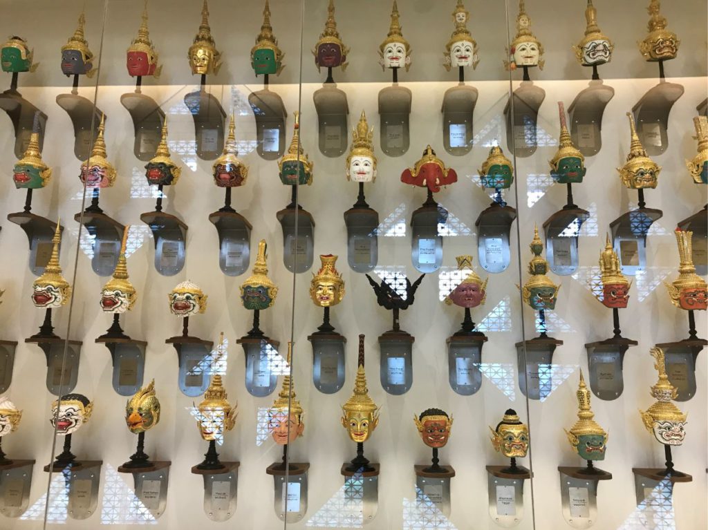 A collection of Khon masks inside MOCA