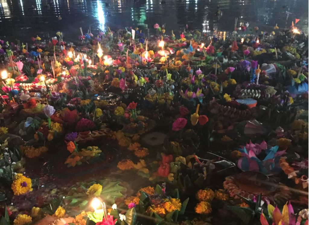 Hundreds of Krathong released in a lake on Loi Krathong, Festival in thailand