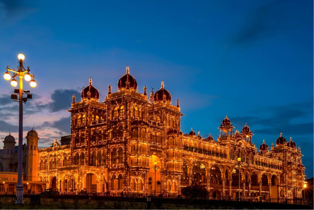 Mysore Palace lit at night, day trip to Mysore