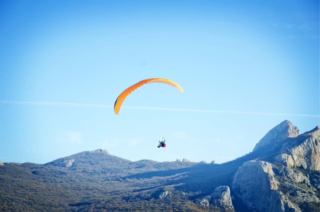 Paragliding with a view of the Himalayan ranges