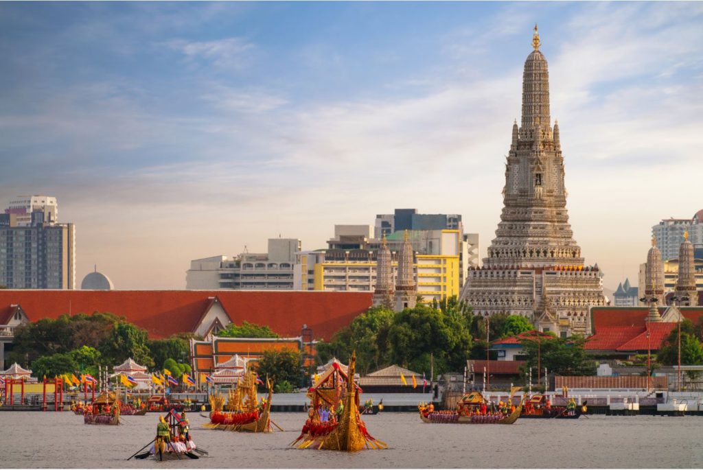 Procession of Royal Barges in front of Wat Arun, Festival in thailand