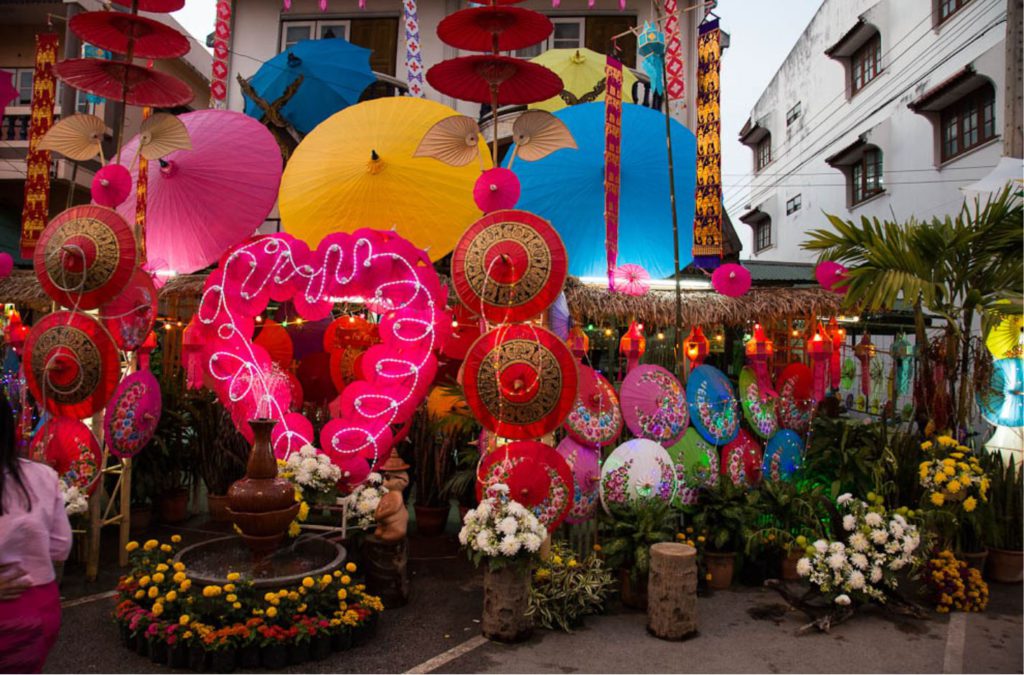 Streets decorated with lit paper umbrella in Bo Sang, Festival in thailand