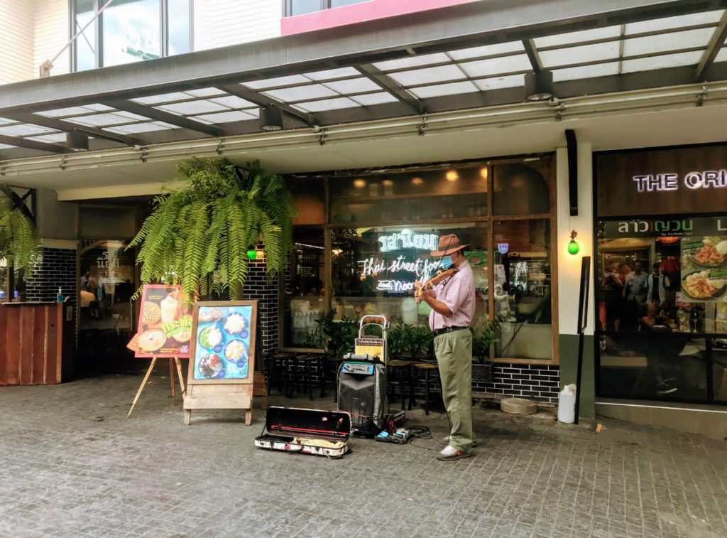 A musician playing inside Tha Maharaj Complex