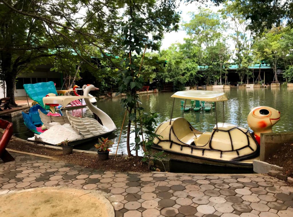 A small lake with boats available for boating inside the museum premises, Thai Human Imagery Museum