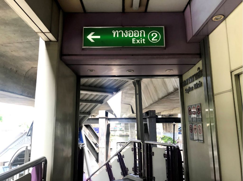 Exit 2 at Saphan Taksin BTS Station towards Sathorn Pier