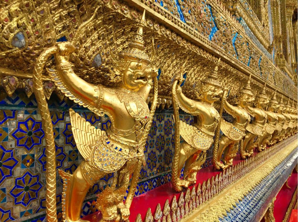 Winged Garuda adorning royal buildings in traditional Thai architecture