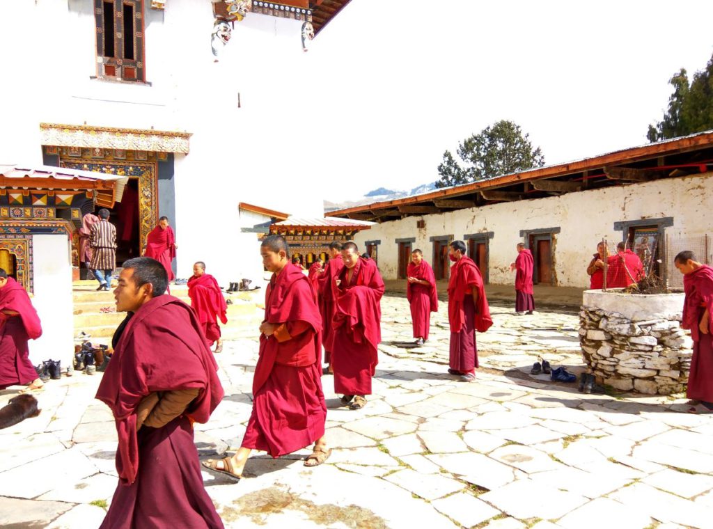 Monks inside the monastery, Phobjikha
