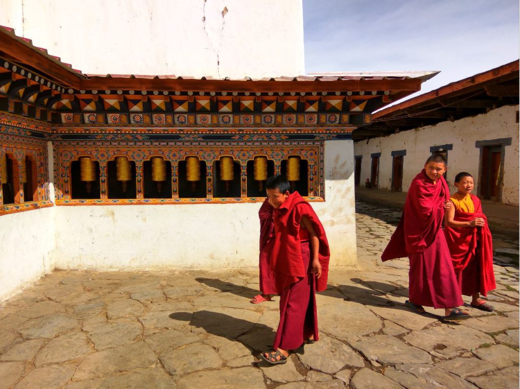 Monks inside the monastery, Phobjikha