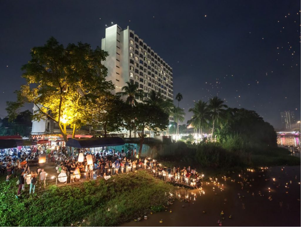 Celebrating Loi Krathong at one of the lakes in Bangkok