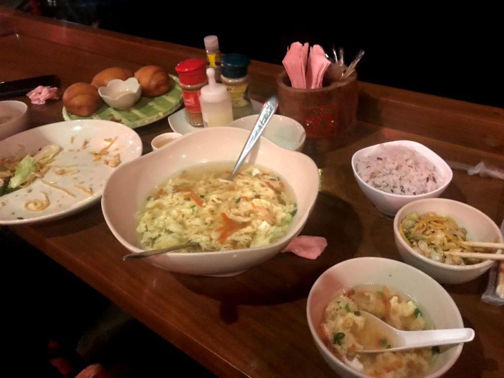 Stir fried noodles, egg soup and fried rice buns Ban Rak Thai
