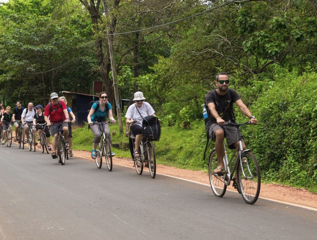 Tourists on cycles