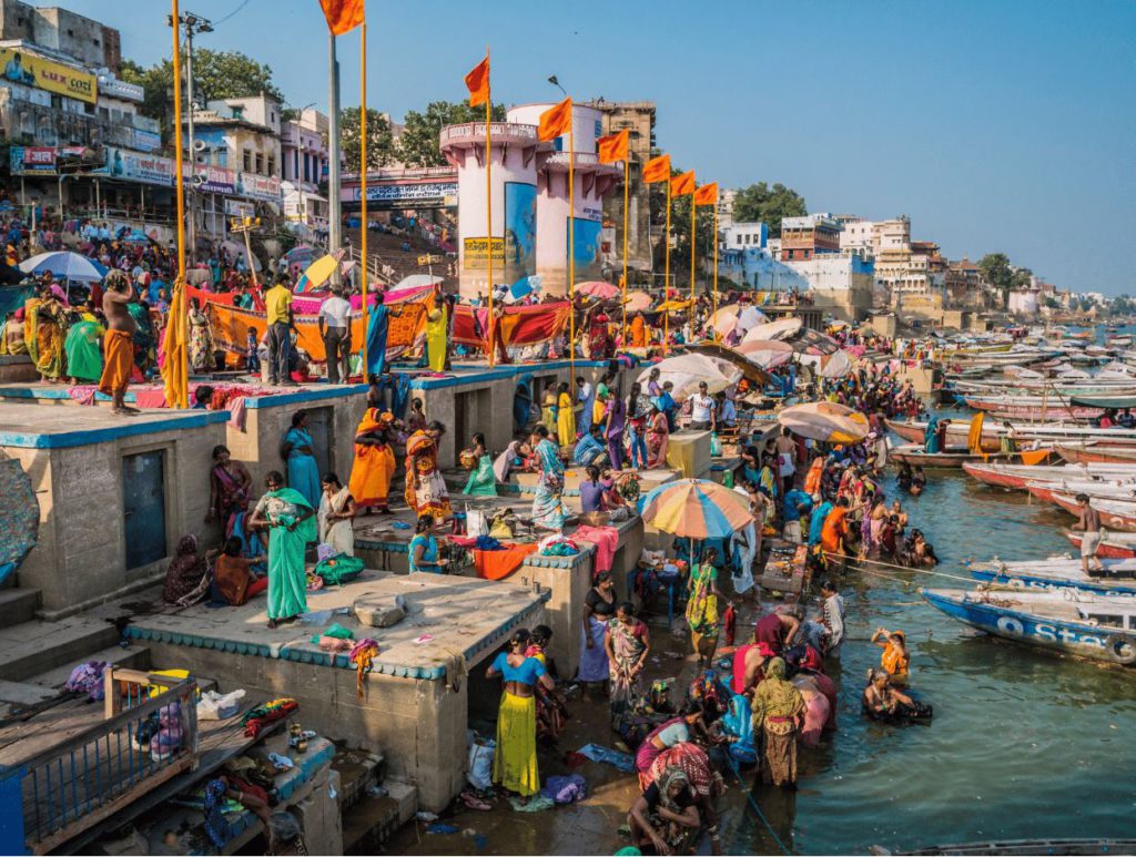 people taking a dip in the river, essentially a hindu practice, Varanasi