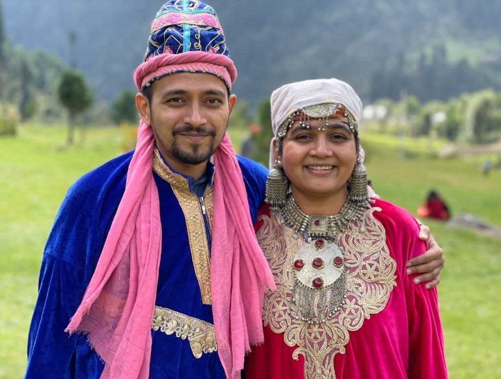 Dressed in traditional Kashmiri attire