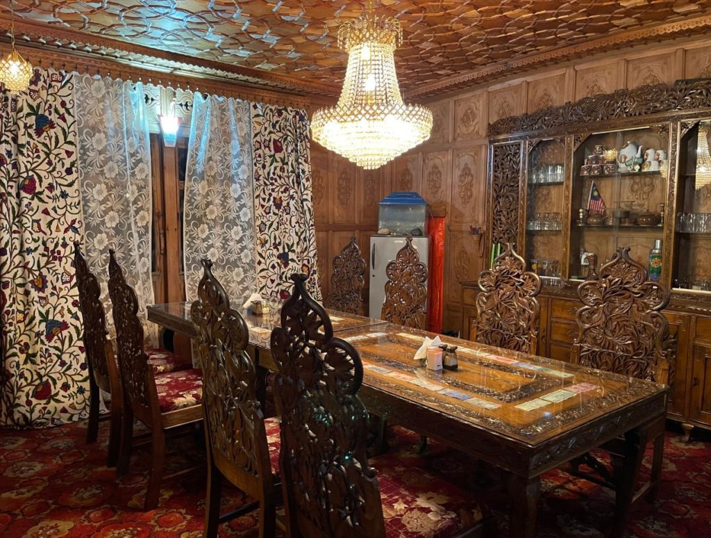 Lavish dining room in traditional kashmiri style