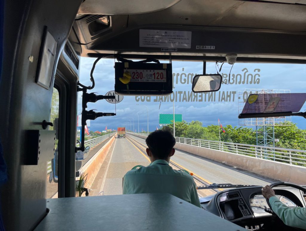 Bus crossing Thai-Lao friendship bridge