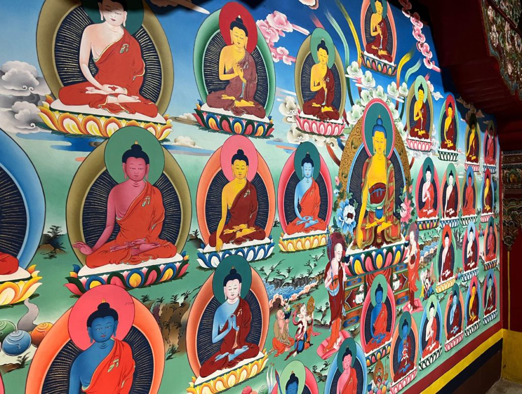 Murals of Buddha inside the monastery