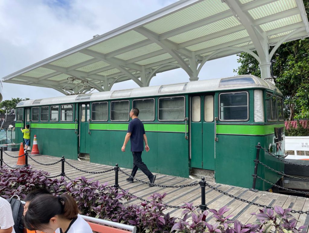 An old tram on display in from on The Peak Galleria