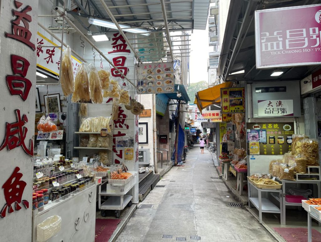 Locals selling dried fish and condiments at the village