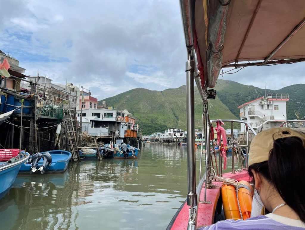 Touring around the village on our boat